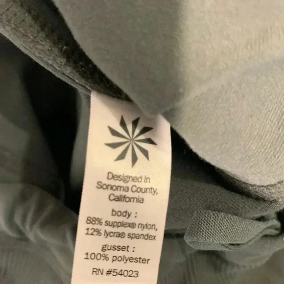 Athleta Green Tapered Ankle Partially Ribbed Athletic Leggings with Pockets - Picture 7 of 7